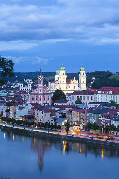 Elevated view towards the picturesque city of Passau illuminated at dusk, Passau