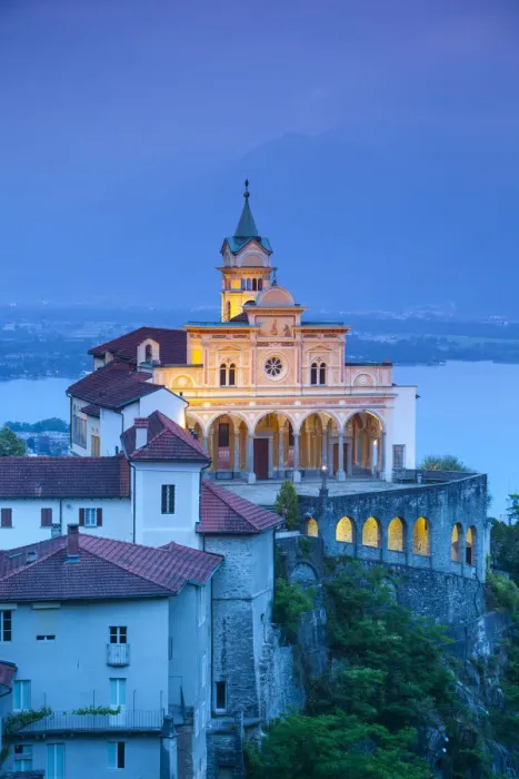 Framed Print : Elevated view over the picturesque Sanctuary of Madonna del Sasso illuminated at dusk
