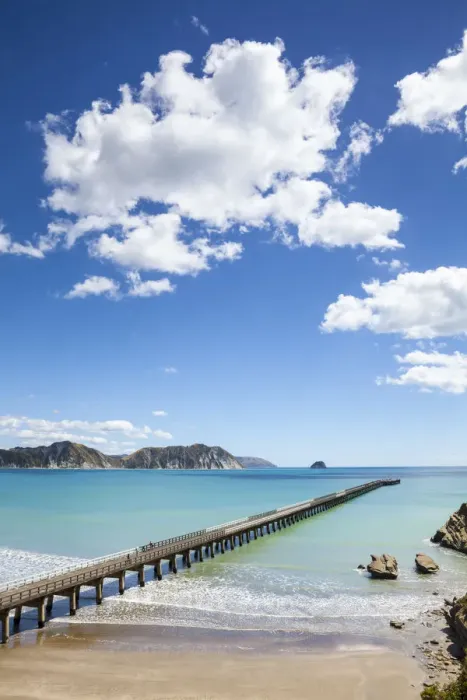 Framed Print : Elevated view over the picturesque Tologa Bay wharf, Tologa Bay, East Cape, North Island