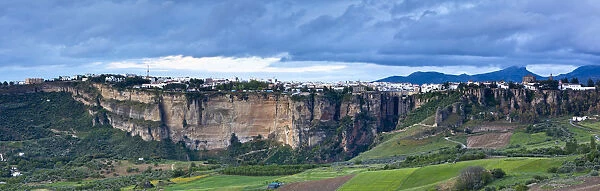 Elevated view over Puento Nuevo & the White Village, Ronda, Malaga Province, Andalusia