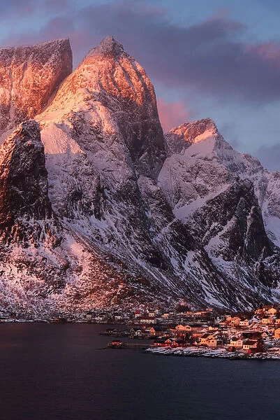 Elevated view of Reine along the coast at sunrise in the Lofoten islands, Norway