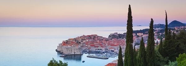 Elevated view over Stari Grad (Old Town) illuminated at sunrise, Dubrovnik, Dalmatia