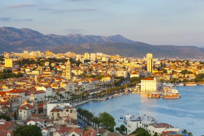 Framed Print : Elevevated view over the picturesque harbour city of Split illuminated at sunset Framed Print : Elevevated view over the picturesque harbour city of Split illuminated at sunset