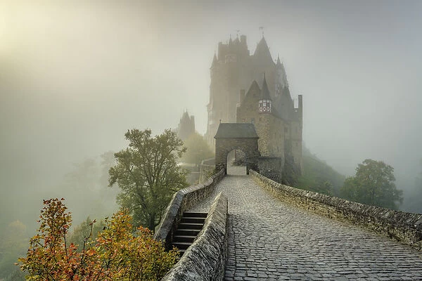 Eltz Castle on a foggy autumn morning, Muenstermaifeld, Rhineland-Palatinate, Germany