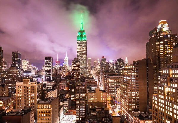 Empire state building and view of the rooftops of Manhattan, New York, USA