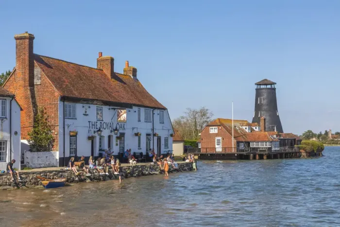 Framed Print : England, Hampshire, Langstone, Chichester Harbour, View of The Royal Oak Pub and Customers at High Tide Framed Print : England, Hampshire, Langstone, Chichester Harbour, View of The Royal Oak Pub and Customers at High Tide