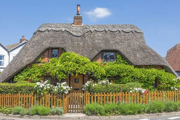 England, Hampshire, Test Valley, Kings Somborne, Traditional Thatched Roof House