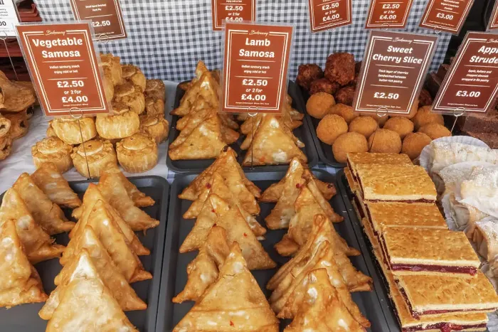 Framed Print : England, Kent, Faversham, Faversham Market, Display of Samosasd Framed Print : England, Kent, Faversham, Faversham Market, Display of Samosasd