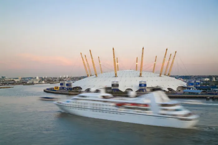 Framed Print : England, London, Ariel view of Cruise ship passing O2 Arena, (Millennium Dome) Framed Print : England, London, Ariel view of Cruise ship passing O2 Arena, (Millennium Dome)