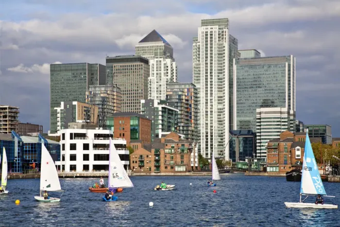 Framed Print : England, London, Docklands, Sailing in Millwall docks infront of Canary Wharf Framed Print : England, London, Docklands, Sailing in Millwall docks infront of Canary Wharf