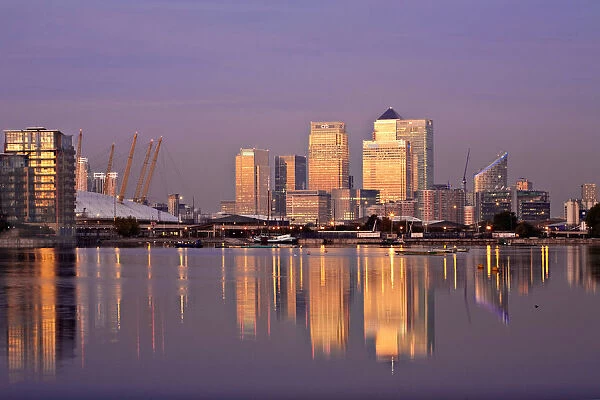 England, London, Newham, Royal Victoria Docks, Canary Wharf buildings and O2 Arena