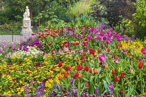 England, London, St. James Park, Spring Flowers in Bloom and The Boy Statue Water