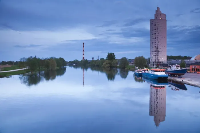 Framed Print : Estonia, Southeastern Estonia, Tartu, highrise building by Emajogi River, dusk Framed Print : Estonia, Southeastern Estonia, Tartu, highrise building by Emajogi River, dusk