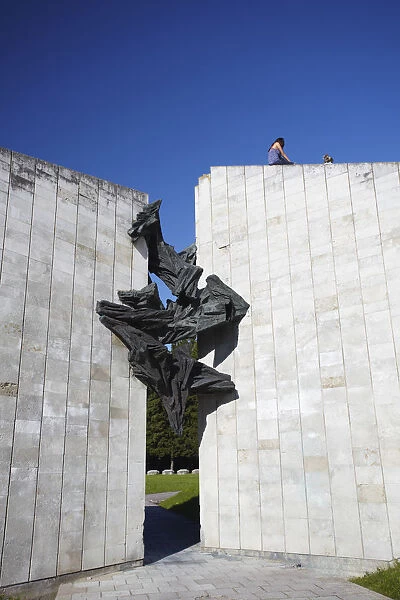 Estonia, Tallinn, Pirita, Girls Sitting On Top Of Soviet War Memorial