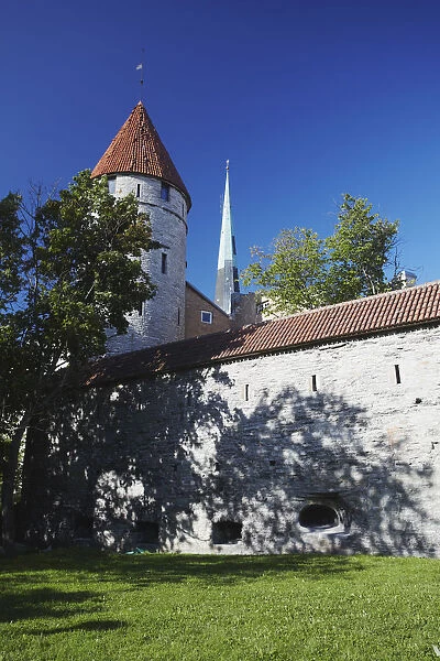 Estonia, Tallinn, Tower On Town Wall With Oleviste Church In Background