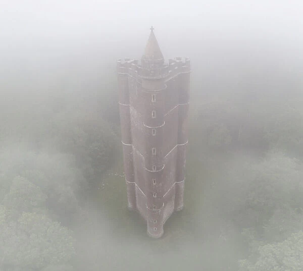 Ethereal mist surrounding King Alfreds Tower, Bruton, Somerset, England