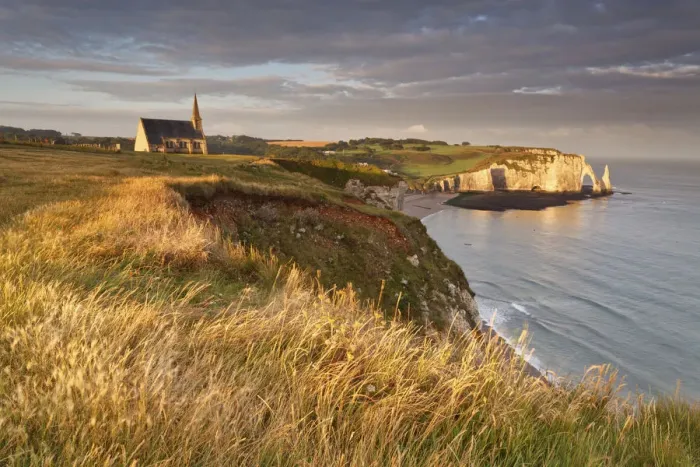 Framed Print : Etratat cliffs, Normandy, France. A small fishing village famous for the its spectacular Framed Print : Etratat cliffs, Normandy, France. A small fishing village famous for the its spectacular