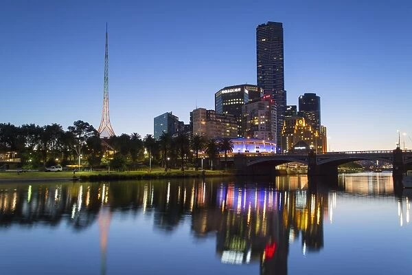 Eureka Tower and skyline along Yarra River at dusk, Melbourne, Victoria, Australia
