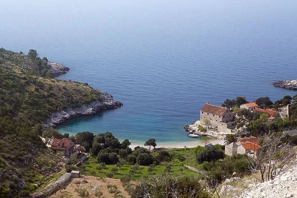 Europe, Balkans, Croatia, Hvar island, a view of the village of Milna and the Vila Tudor