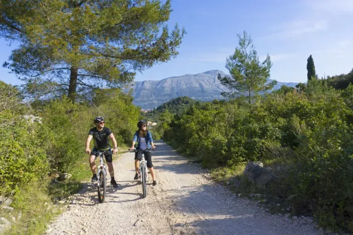 Framed Print : Europe, Balkans, Croatia, Korcula, cyclists mountain biking around Korcula island (MR)