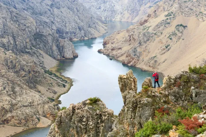 Framed Print : Europe, Croatia, Dalmatia, Zadar region, a photographer standing over the Zrmanja Canyon