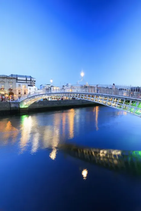 Framed Print : Europe, Dublin, Ireland, Halfpenny bridge by night reflecting on the Liffey river Framed Print : Europe, Dublin, Ireland, Halfpenny bridge by night reflecting on the Liffey river