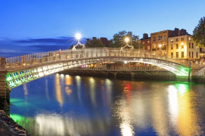 Framed Print : Europe, Dublin, Ireland, Halfpenny bridge reflecting on the Liffey river by night Framed Print : Europe, Dublin, Ireland, Halfpenny bridge reflecting on the Liffey river by night