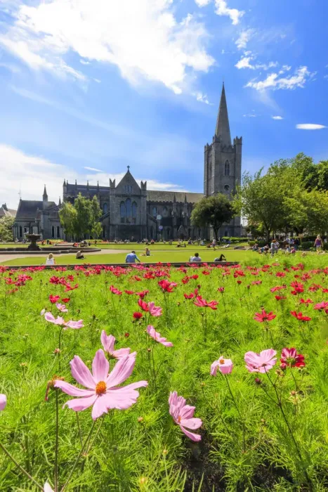 Framed Print : Europe, Dublin, Ireland, people sitting on the gardens at St. Patrick Cathedral