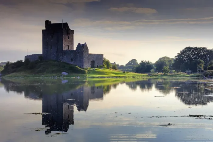 Framed Print : Europe, Ireland, Dunguaire castle at sunrise in Kinvara village reflecting in Framed Print : Europe, Ireland, Dunguaire castle at sunrise in Kinvara village reflecting in