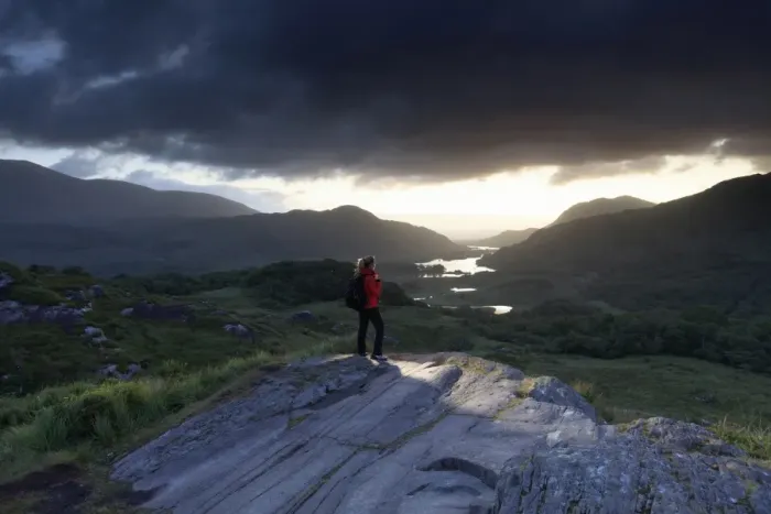 Framed Print : Europe, Ireland, ring of Kerry, Kerry county, woman alone at Ladys view viewpoint before sunrise