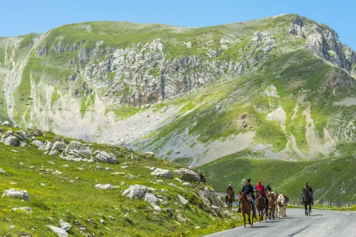 Framed Print : europe, Italy, the Abruzzi. Riders on a road in the National Park of Gran Sasso Framed Print : europe, Italy, the Abruzzi. Riders on a road in the National Park of Gran Sasso