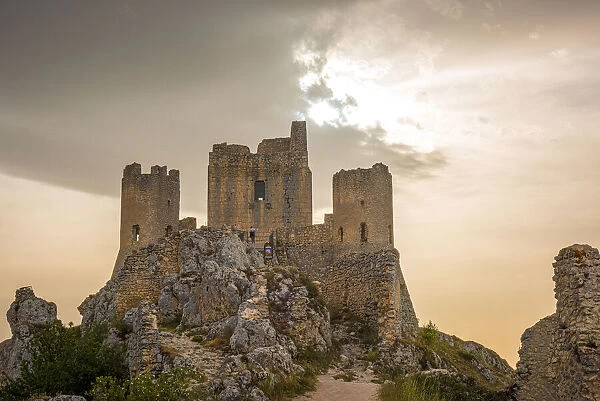 europe, Italy, the Abruzzi. Rocca Calascio at sunset with dramatic clouds building up