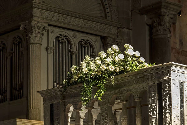 europe, Italy, Friuli-Venezia-Giulia. Fresh flowers on the altar of the cathedral