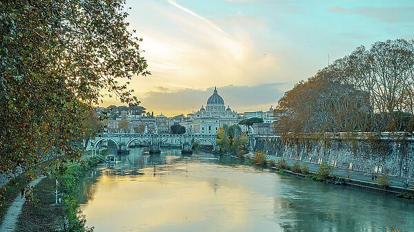 europe, Italy, Latium and Vatican. Sunset with Saint Peter´s Basilica and the river Tiber
