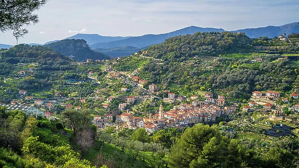 Europe, Italy, Liguria. The little village of Vallebona in the hills above Bordighera seen from the footpath