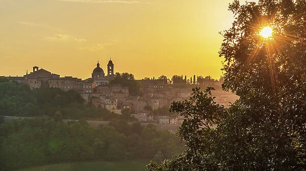 europe, Italy, The Marches. Urbino, the view of the town with the cathedral at sunset