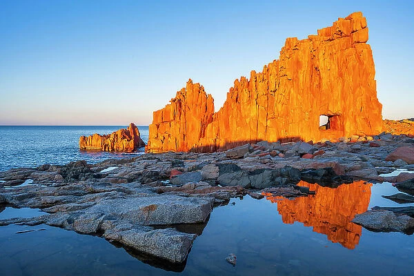 Europe, Italy, Sardinia. The red rocks of Arbatax at sunset