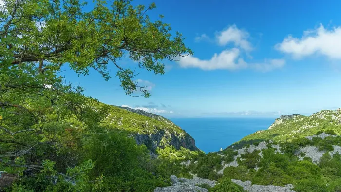 Framed Print : Europe, Italy, Sardinia. View from the footpath towards the rock formations of Cala Goloritze