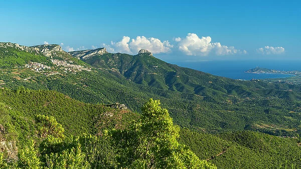 Europe, Italy, Sardinia. View towards the village of Baunei and the coast