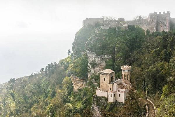 Europe, Italy, Sicily. The castle of Venus in Erice in a typical foggy morning
