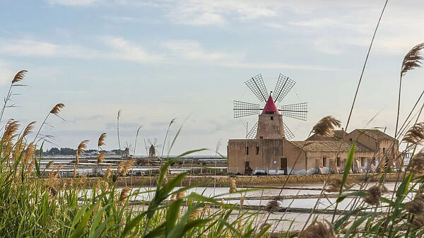 europe, Italy, Sicily. Marsala the salt flats with the ancient wind mill