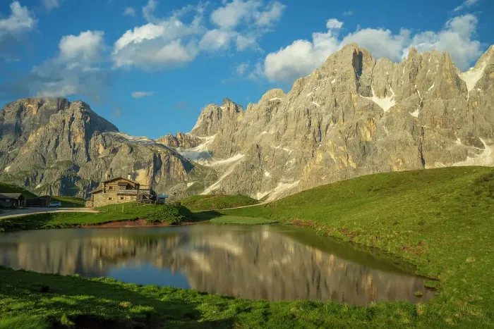 Framed Print : Europe, Italy, Trentino. The peaks of the Pala Group, the biggest massif of the Dolomites, Unesco World Heritage site at sunset. Reflecting in the little lake near to the mountain hut Rifugio Segantini