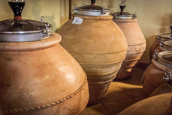 europe, Italy, Tuscany, Elba Island, Porto Azzurro. Amphorae in a wine cellar
