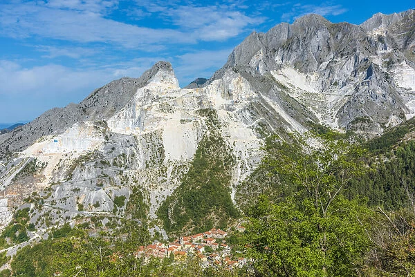 Europe, Italy, Tuscany. The marble quarries and the little village of Colonnata above