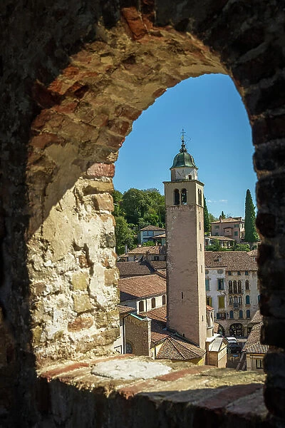 Europe, Italy, Veneto. Asolo, view above the roofs towards the tower of the cathedral