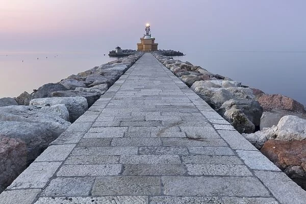 Europe, Italy, Veneto, Venice, Cavallino coast. Lighthouse of Punta Sabbioni at dawn