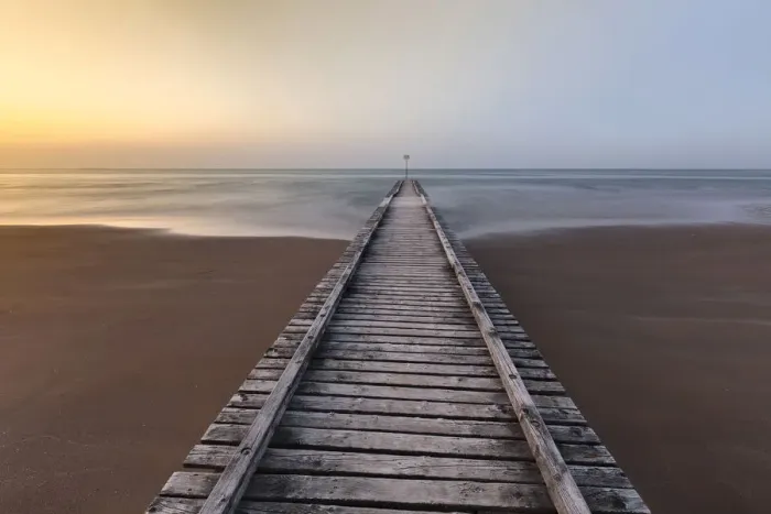 Framed Print : Europe, Italy, Veneto, Venice, Jesolo. A wooden pier on the beach towards adriatic sea Framed Print : Europe, Italy, Veneto, Venice, Jesolo. A wooden pier on the beach towards adriatic sea