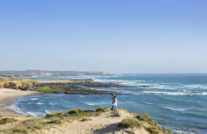 Framed Print : Europe, Portugal, Alentejo, Vila Nova de Milfontes, a young couple on praia carreiro Framed Print : Europe, Portugal, Alentejo, Vila Nova de Milfontes, a young couple on praia carreiro