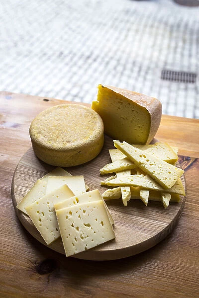 Europe, Spain, Catalonia, Val d Aran, Variety of cheeses in a gourmet shop of Vielha