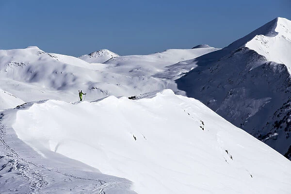 Europe, Spain, Catalonia, Val d Aran, A skier approaching a off-piste slope in